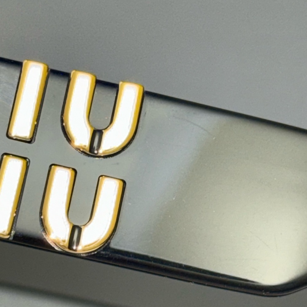 Miu Miu Black Oval Sunglasses with Gold Logo Temples - Picture 9 of 14